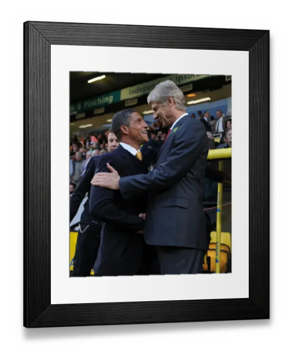 Framed Print : Arsene Wenger and Chris Hughton Before Norwich City vs Arsenal (2012-13) Framed Print : Arsene Wenger and Chris Hughton Before Norwich City vs Arsenal (2012-13)