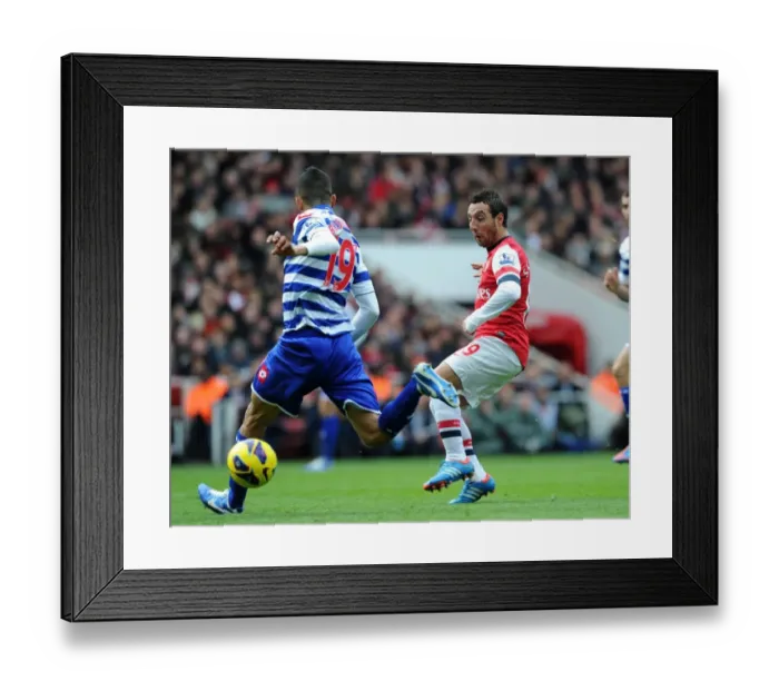 Framed Print : Arsenal's Santi Cazorla Outmaneuvers QPR's Jose Bosingwa Framed Print : Arsenal's Santi Cazorla Outmaneuvers QPR's Jose Bosingwa