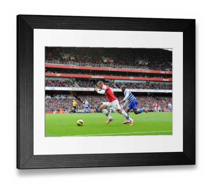 Framed Print : Lukas Podolski (Arsenal) Shaun Wright-Phillips (QPR). Arsenal 1: 0 Queens Park Rangers