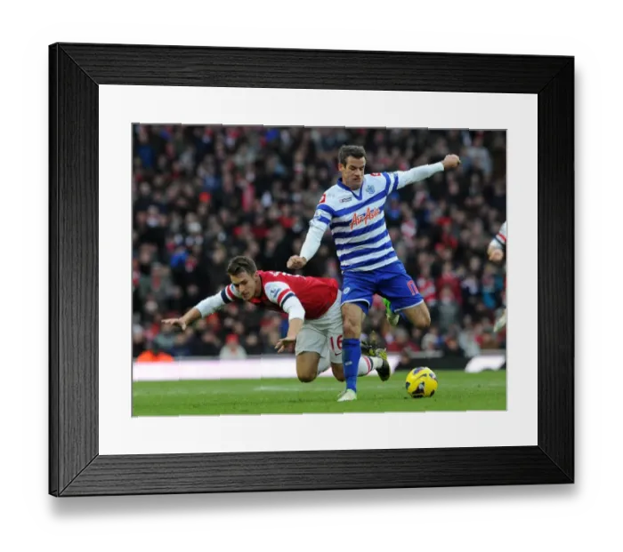 Framed Print : Arsenal's Aaron Ramsey Fouls by QPR's Ryan Nelson (2012-13) Framed Print : Arsenal's Aaron Ramsey Fouls by QPR's Ryan Nelson (2012-13)