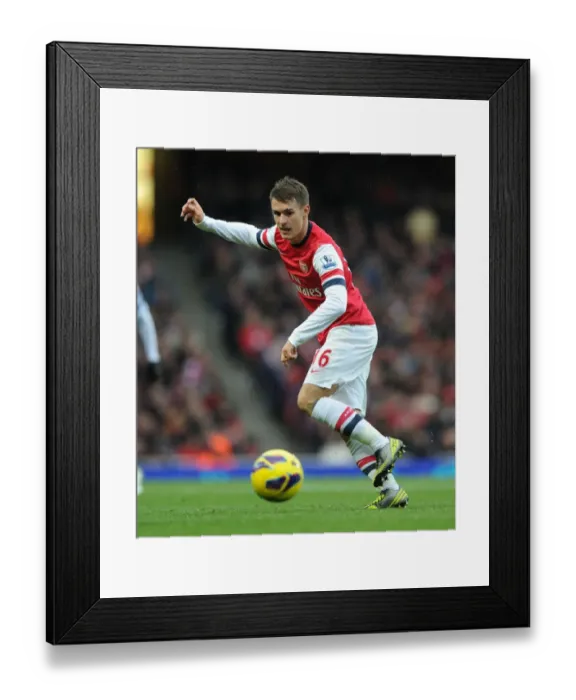 Framed Print : Aaron Ramsey in Action: Arsenal vs. Queens Park Rangers, Premier League 2012-13
