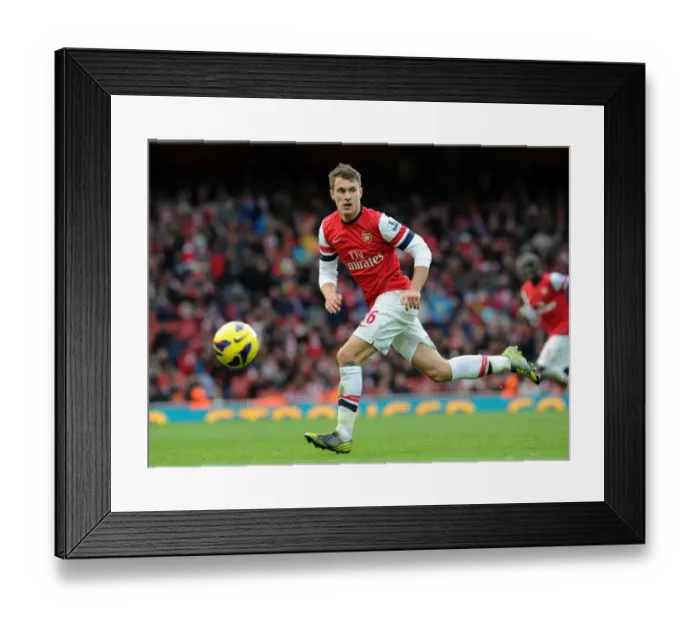 Framed Print : Aaron Ramsey in Action: Arsenal vs. Queens Park Rangers (2012-13) Framed Print : Aaron Ramsey in Action: Arsenal vs. Queens Park Rangers (2012-13)