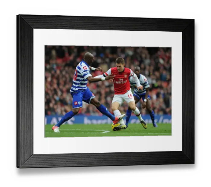 Framed Print : Intense Rivalry: Ramsey vs. Mbia - Arsenal vs. Queens Park Rangers (2012-13) Framed Print : Intense Rivalry: Ramsey vs. Mbia - Arsenal vs. Queens Park Rangers (2012-13)