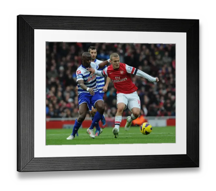 Framed Print : Arsenal's Jack Wilshere Faces Off Against QPR's Samba Diakite (2012-13) Framed Print : Arsenal's Jack Wilshere Faces Off Against QPR's Samba Diakite (2012-13)