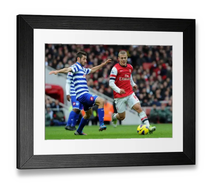 Framed Print : Arsenal's Jack Wilshere Clashes with QPR's Esteban Granero (2012-13) Framed Print : Arsenal's Jack Wilshere Clashes with QPR's Esteban Granero (2012-13)