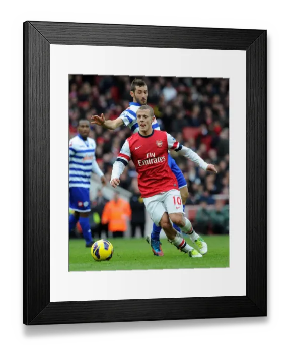 Framed Print : Arsenal's Jack Wilshere Clashes with Queens Park Rangers Esteban Granero (2012-13)