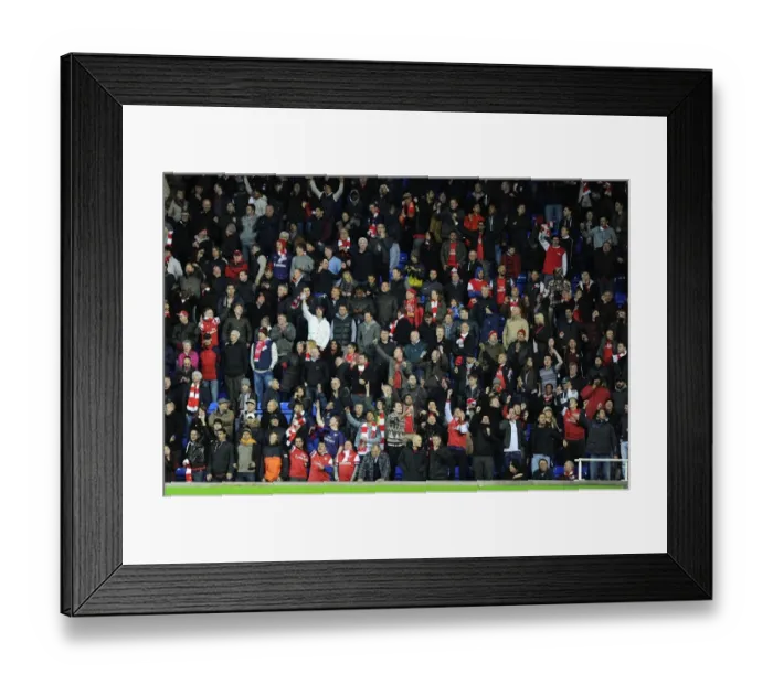 Framed Print : Arsenal Fans Celebrate Upset Win Against Reading in Capital One Cup