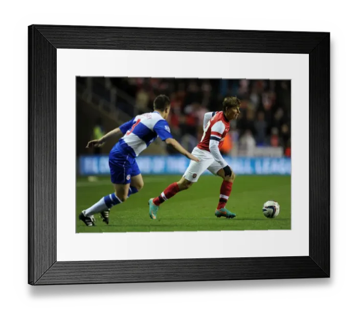 Framed Print : Andrey Arshavin (Arsenal) Nicky Shorey (Reading). Reading 5: 7 Arsenal. Capital One Cup Framed Print : Andrey Arshavin (Arsenal) Nicky Shorey (Reading). Reading 5: 7 Arsenal. Capital One Cup