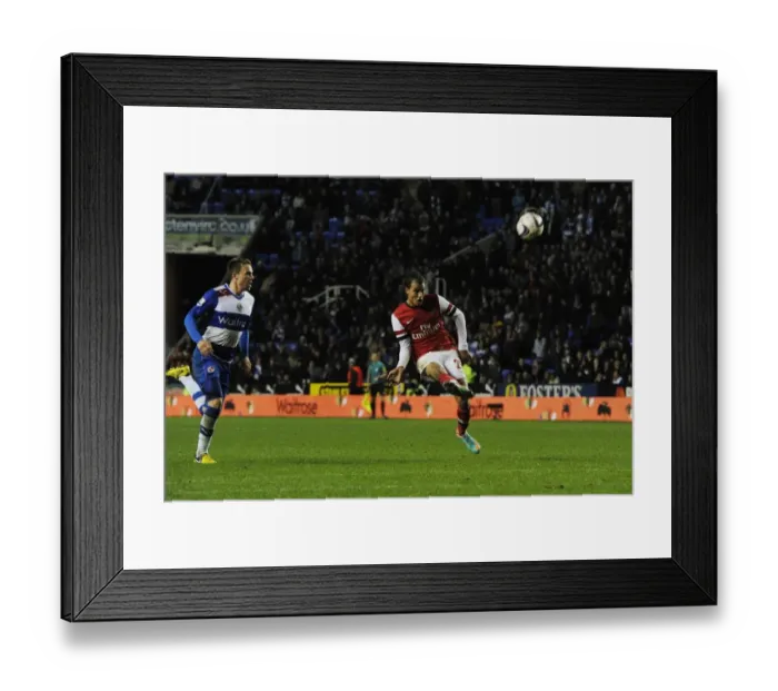 Framed Print : Marouane Chamakh Scores Sensational Chip Against Reading in Capital One Cup Framed Print : Marouane Chamakh Scores Sensational Chip Against Reading in Capital One Cup