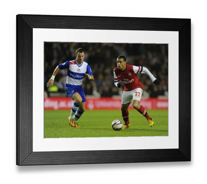 Framed Print : Coquelin Charges Past Hunt: Reading vs. Arsenal in Capital One Cup