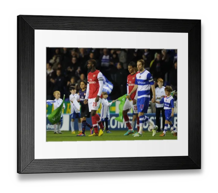 Framed Print : Johan Djourou (Arsenal) with the mascot. Reading 5: 7 Arsenal. Capital One Cup
