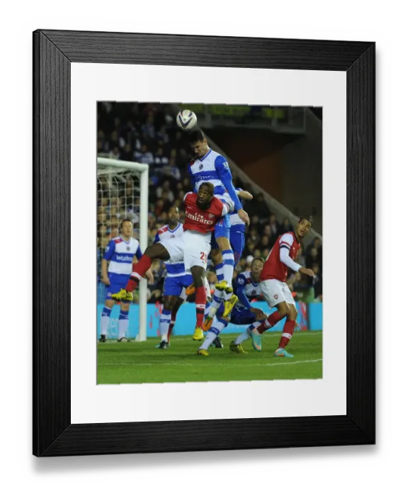 Framed Print : Johan Djourou vs. Sean Morrison: Clash in the Capital One Cup Between Reading and Arsenal Framed Print : Johan Djourou vs. Sean Morrison: Clash in the Capital One Cup Between Reading and Arsenal