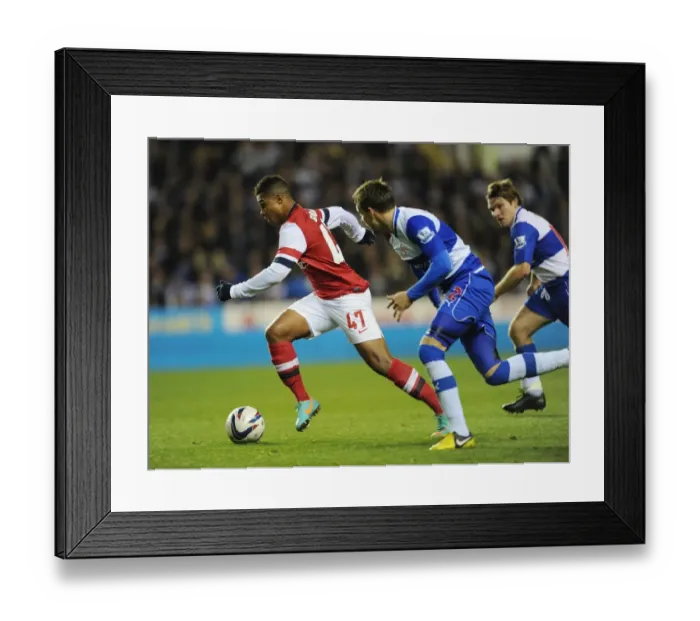 Framed Print : Serge Gnabry vs. Chris Gunter: Arsenal's Capital One Cup Battle at Reading Framed Print : Serge Gnabry vs. Chris Gunter: Arsenal's Capital One Cup Battle at Reading