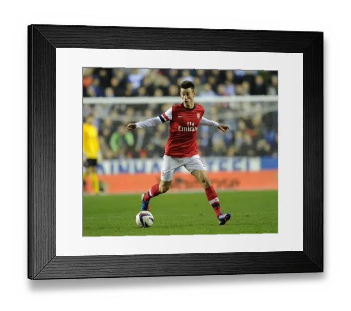 Framed Print : Laurent Koscielny Focuses in Reading v Arsenal Capital One Cup Match Framed Print : Laurent Koscielny Focuses in Reading v Arsenal Capital One Cup Match