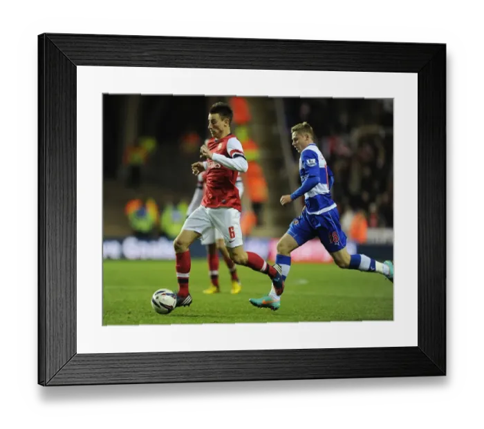 Framed Print : Laurent Koscielny Breaks Past Simon Church: Arsenal's Capital One Cup Victory over Reading (October 2012)