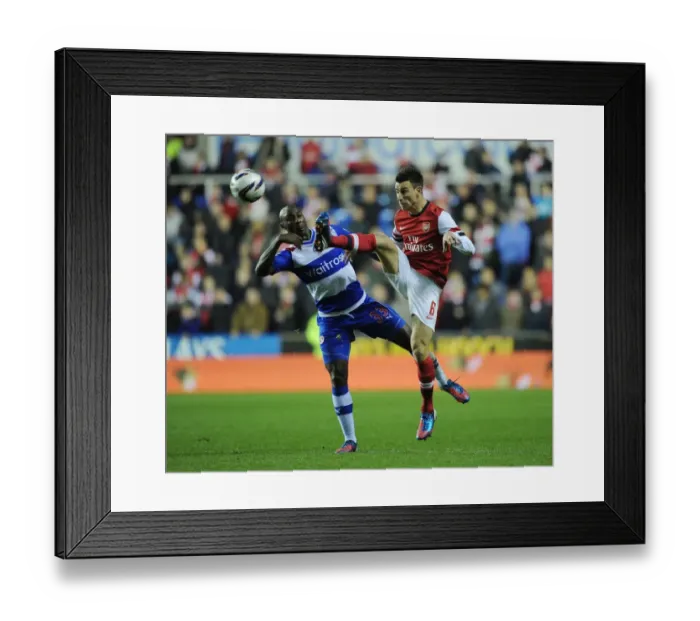 Framed Print : Arsenal vs. Reading: Laurent Koscielny Faces Off Against Jason Roberts in Capital One Cup Clash Framed Print : Arsenal vs. Reading: Laurent Koscielny Faces Off Against Jason Roberts in Capital One Cup Clash