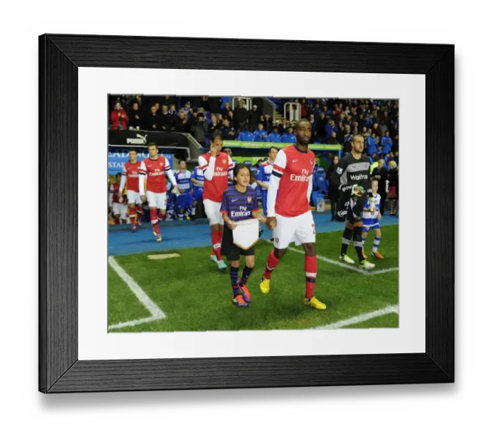 Framed Print : Arsenal's Johan Djourou and Mascot Before Capital One Cup Match vs. Reading