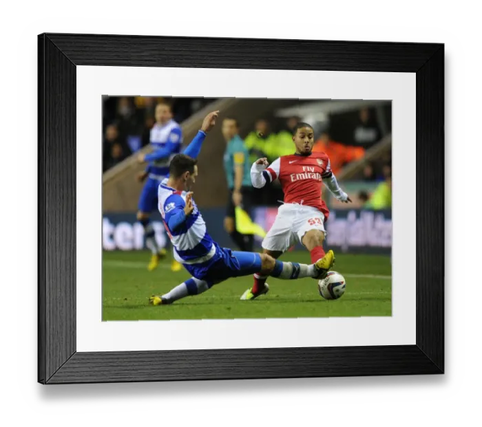 Framed Print : Jernade Meade vs. Sean Morrison: A Battle in the Capital One Cup Fourth Round between Reading and Arsenal Framed Print : Jernade Meade vs. Sean Morrison: A Battle in the Capital One Cup Fourth Round between Reading and Arsenal