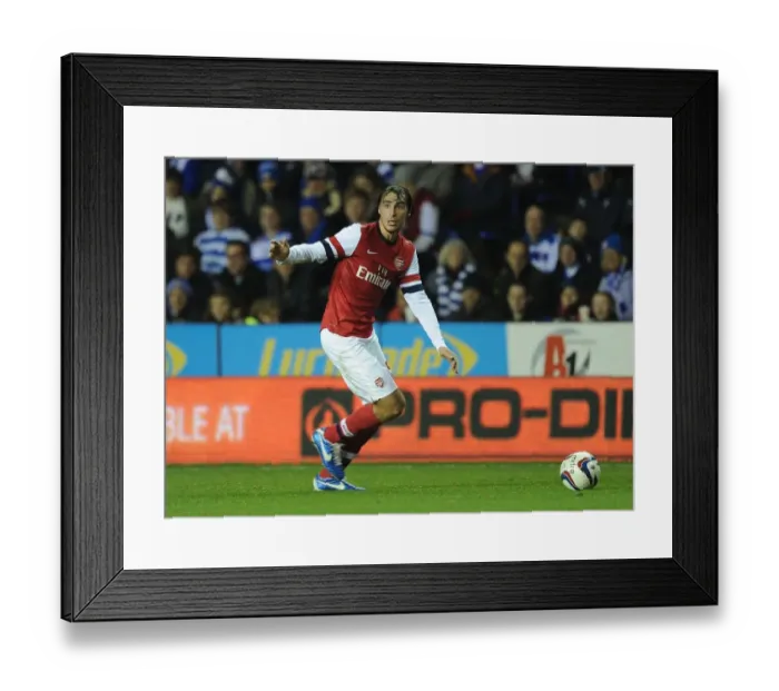 Framed Print : Arsenal's Ignasi Miquel in Action against Reading in Capital One Cup Framed Print : Arsenal's Ignasi Miquel in Action against Reading in Capital One Cup