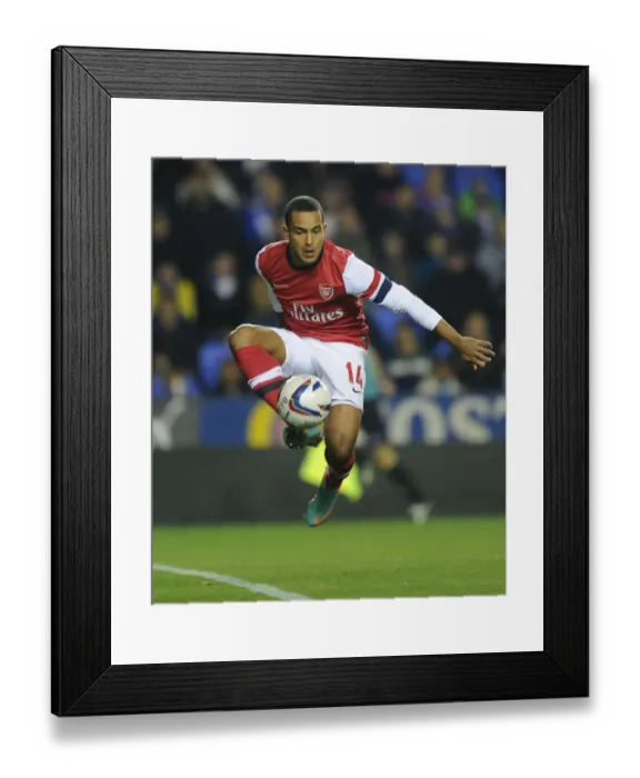 Framed Print : Theo Walcott in Action: Arsenal vs. Reading - Capital One Cup 2012-13
