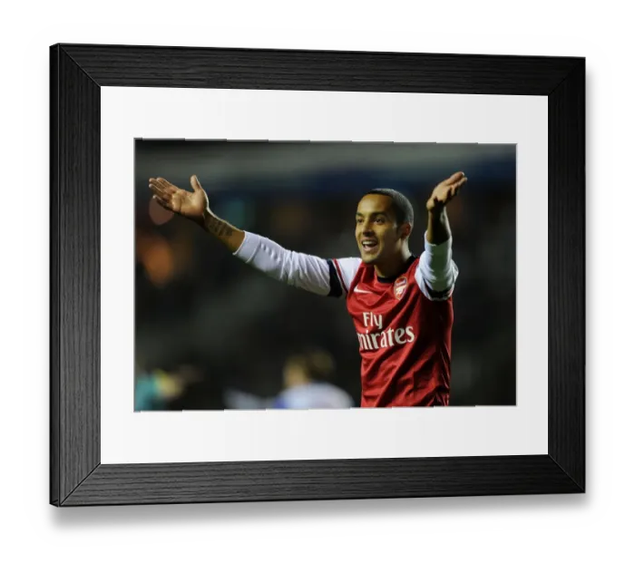 Framed Print : Theo Walcott in Action: Arsenal's Star Forward Shines Against Reading in Capital One Cup 2012-13