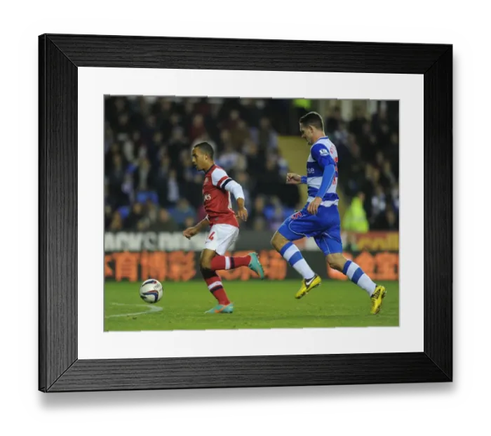 Framed Print : Theo Walcott Scores First Goal: Arsenal Triumphs Over Reading in Capital One Cup