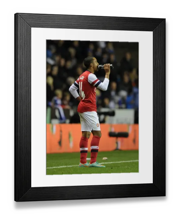Framed Print : Theo Walcott (Arsenal). Reading 5: 7 Arsenal. Capital One Cup. Round 4. The Madejski Stadium Framed Print : Theo Walcott (Arsenal). Reading 5: 7 Arsenal. Capital One Cup. Round 4. The Madejski Stadium