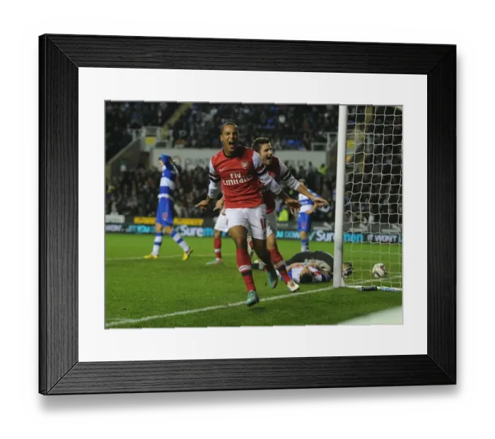 Framed Print : Theo Walcott's Hat-Trick: Arsenal Cruises Past Reading in Capital One Cup