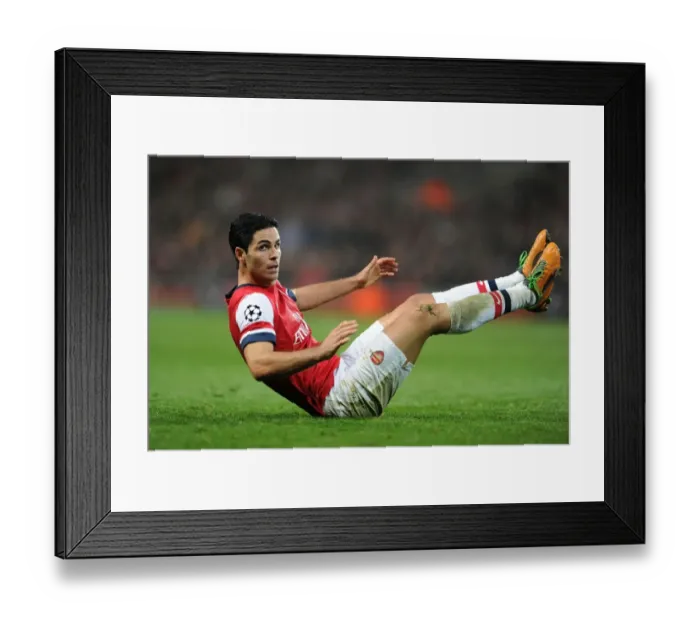 Framed Print : Mikel Arteta Leads Arsenal in Champions League Battle against Schalke 04 (2012) Framed Print : Mikel Arteta Leads Arsenal in Champions League Battle against Schalke 04 (2012)
