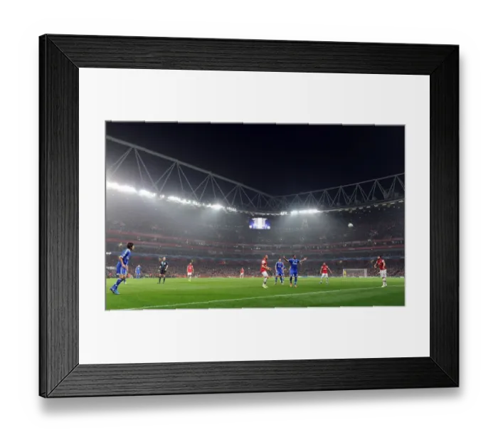 Framed Print : Arsenal FC vs. FC Schalke 04: A Champions League Battle at Emirates Stadium, 2012