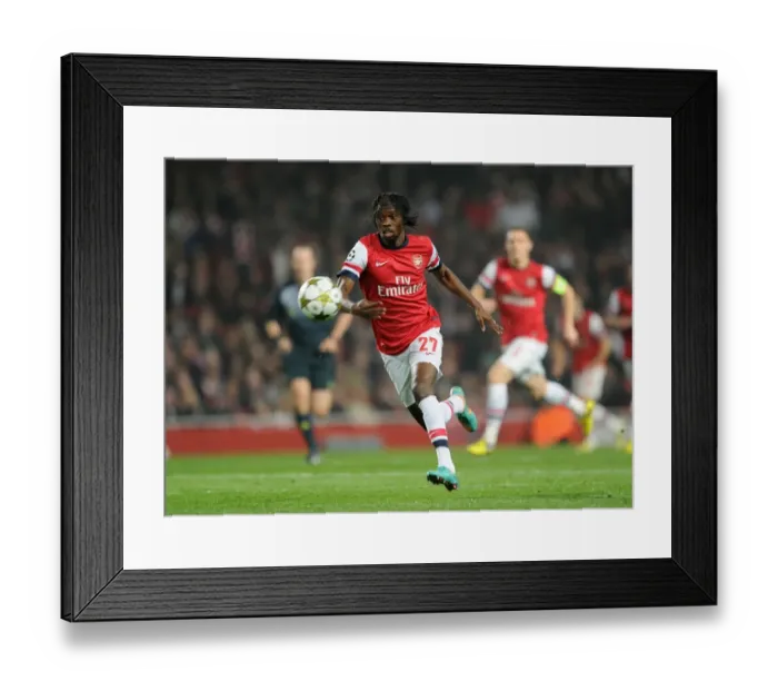 Framed Print : Gervinho in Action: Arsenal vs. Schalke 04, UEFA Champions League 2012-13