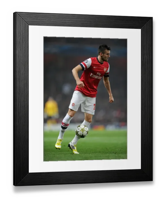 Framed Print : Arsenal's Carl Jenkinson in Action Against Schalke 04, UEFA Champions League 2012-13 Framed Print : Arsenal's Carl Jenkinson in Action Against Schalke 04, UEFA Champions League 2012-13