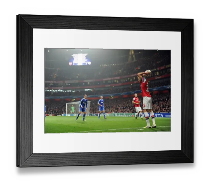 Framed Print : Arsenal's Carl Jenkinson Takes a Throw-In during UEFA Champions League Match against Schalke 04 (2012-13) Framed Print : Arsenal's Carl Jenkinson Takes a Throw-In during UEFA Champions League Match against Schalke 04 (2012-13)