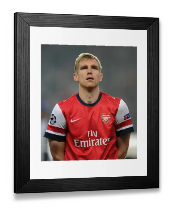 Framed Print : Per Mertesacker: Arsenal's Fortress at Emirates Against Schalke 04, UEFA Champions League 2012 Framed Print : Per Mertesacker: Arsenal's Fortress at Emirates Against Schalke 04, UEFA Champions League 2012