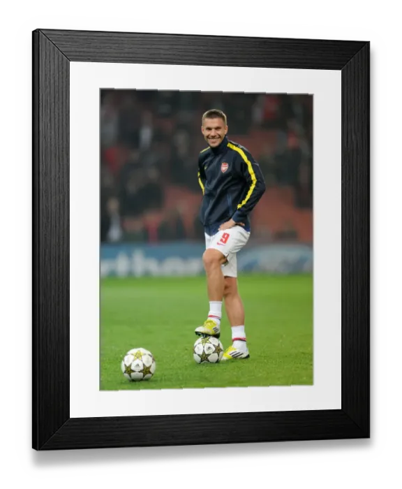 Framed Print : Arsenal's Deadly Dynamo: Lukas Podolski Gears Up for FC Schalke 04 Showdown in 2012-13 Champions League Framed Print : Arsenal's Deadly Dynamo: Lukas Podolski Gears Up for FC Schalke 04 Showdown in 2012-13 Champions League