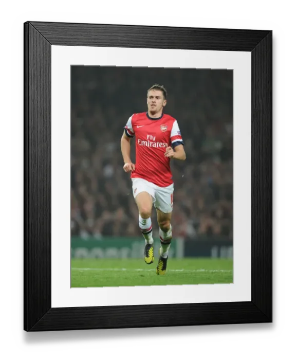 Framed Print : Aaron Ramsey in Action: Arsenal vs. Schalke 04, UEFA Champions League 2012-13 Framed Print : Aaron Ramsey in Action: Arsenal vs. Schalke 04, UEFA Champions League 2012-13
