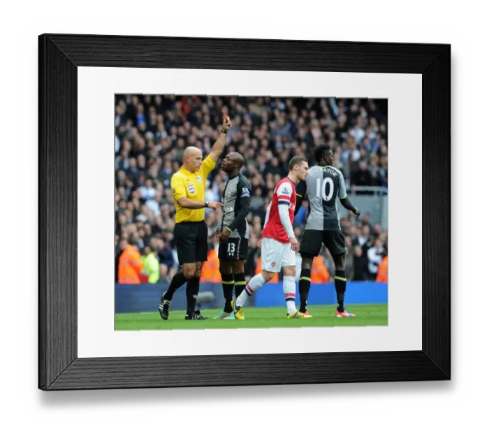 Framed Print : Arsenal vs. Tottenham: Howard Webb Shows Red Card to Emmanuel Adebayor Framed Print : Arsenal vs. Tottenham: Howard Webb Shows Red Card to Emmanuel Adebayor