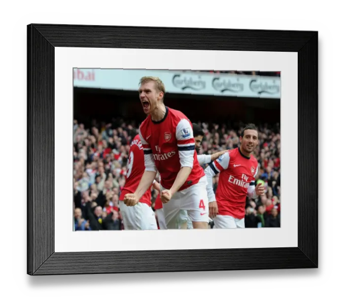 Framed Print : Per Mertesacker's Stunner: Arsenal's 5-2 Victory Over Tottenham in the Premier League Framed Print : Per Mertesacker's Stunner: Arsenal's 5-2 Victory Over Tottenham in the Premier League
