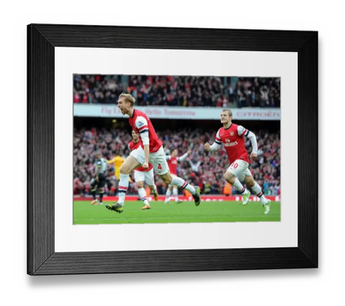 Framed Print : Per Mertesacker's Thriller: Arsenal's First in a 5-2 Victory Over Tottenham