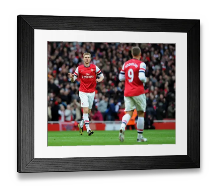 Framed Print : Arsenal: Per Mertesacker Consoles Lukas Podolski Amidst Rivalry - Arsenal v Tottenham Hotspur, 2012-13 Framed Print : Arsenal: Per Mertesacker Consoles Lukas Podolski Amidst Rivalry - Arsenal v Tottenham Hotspur, 2012-13