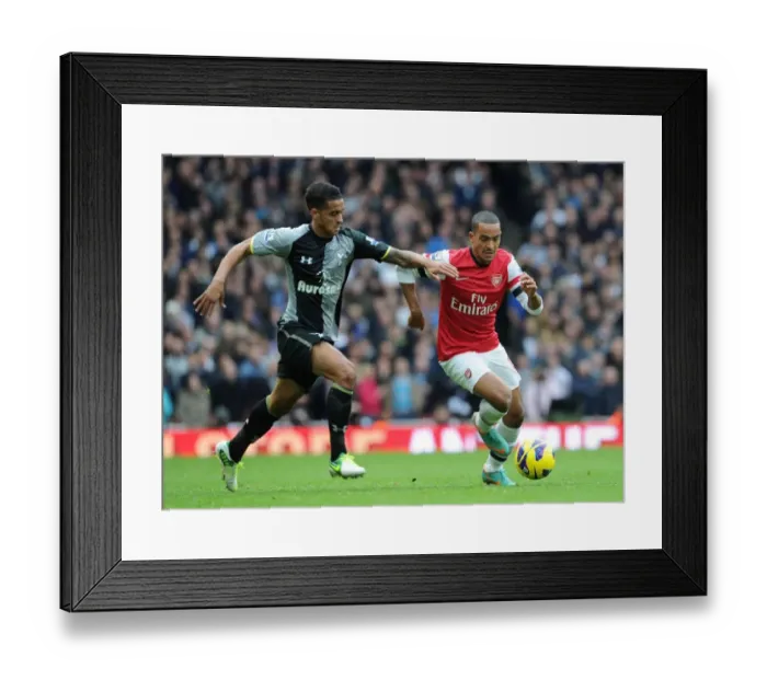 Framed Print : Theo Walcott vs. Kyle Naughton: A Riveting Battle at Emirates Stadium (Arsenal vs. Tottenham Hotspur, 2012-13)