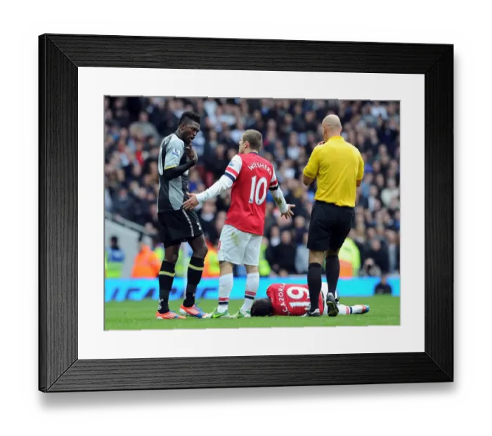 Framed Print : Arsenal vs. Tottenham: Wilshere-Adebayor Rivalry Reignites in Contentious Cazorla Foul Framed Print : Arsenal vs. Tottenham: Wilshere-Adebayor Rivalry Reignites in Contentious Cazorla Foul