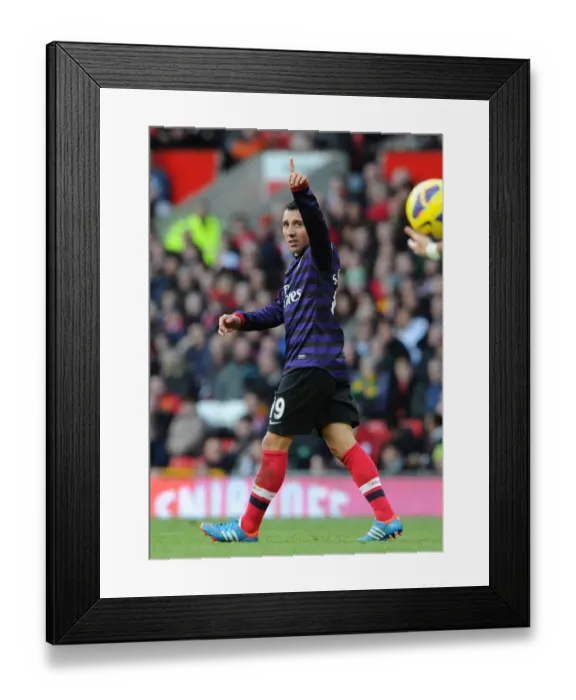 Framed Print : Santi Cazorla's Epic Goal: Arsenal's Triumph Over Manchester United (Premier League 2012-13) - The Unforgettable Moment