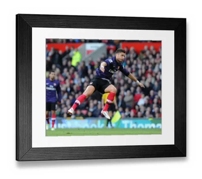 Framed Print : Giroud vs Manchester United: A Premier League Battle (2012-13)