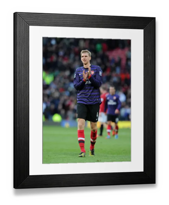 Framed Print : Per Mertesacker Celebrates with Arsenal Fans after Manchester United Victory (2012-13) Framed Print : Per Mertesacker Celebrates with Arsenal Fans after Manchester United Victory (2012-13)