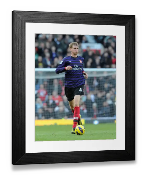 Framed Print : Per Mertesacker (Arsenal). Manchester United 2: 1 Arsenal. Barclays Premier League