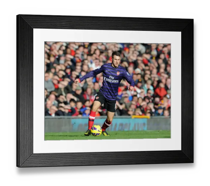 Framed Print : Aaron Ramsey in Action: Manchester United vs. Arsenal, Premier League 2012-13 Framed Print : Aaron Ramsey in Action: Manchester United vs. Arsenal, Premier League 2012-13