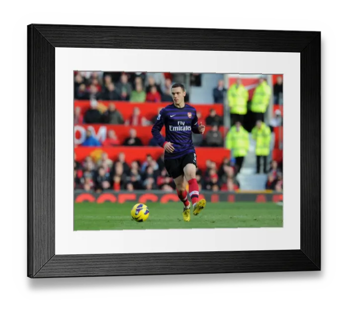 Framed Print : Thomas Vermaelen (Arsenal). Manchester United 2: 1 Arsenal. Barclays Premier League Framed Print : Thomas Vermaelen (Arsenal). Manchester United 2: 1 Arsenal. Barclays Premier League