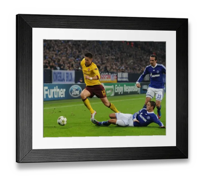Framed Print : Giroud vs. Afellay: Schalke 04 vs. Arsenal FC - UEFA Champions League Showdown (2012-13) Framed Print : Giroud vs. Afellay: Schalke 04 vs. Arsenal FC - UEFA Champions League Showdown (2012-13)