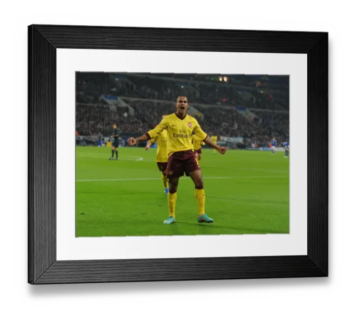 Framed Print : Theo Walcott's Strike: Arsenal's Victory Over Schalke 04 in the 2012-13 UEFA Champions League Framed Print : Theo Walcott's Strike: Arsenal's Victory Over Schalke 04 in the 2012-13 UEFA Champions League